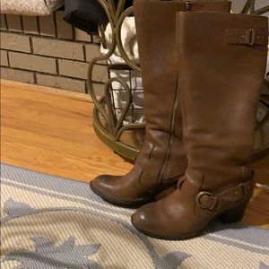Long heeled brown born boots.